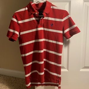 American Eagle red and white striped polo.